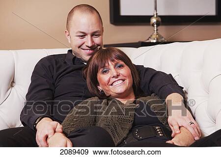 Young married couple in love spending quality time together; edmonton, alberta, canada View Large Photo Image Stock Photo - Young married couple in love spending quality time together; edmonton, alberta, canada. Fotosearch
