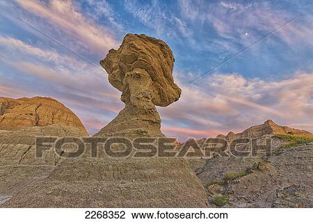 A large hoodoo balanced on a pedestal badlands national park; south dakota united states of america View Large Photo Image Stock Image - A large hoodoo balanced on a pedestal badlands national park; south dakota united states of america. Fotosearch