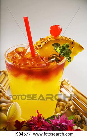 Stock Photo - A Mai Tai Garnished With Pinapple And A Cherry.. Fotosearch