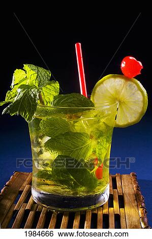 A Mojito Garnished With Fruit And Mint. View Large Photo Image Stock Photograph - A Mojito Garnished With Fruit And Mint.. Fotosearch