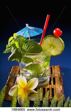 A Mojito Garnished With Fruit And Mint. View Large Photo Image Stock Photography - A Mojito Garnished With Fruit And Mint.. Fotosearch