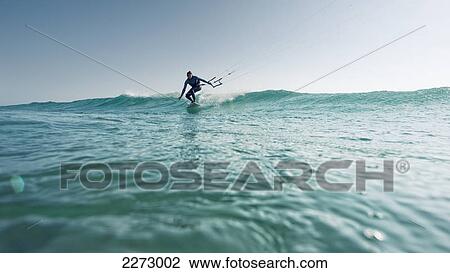 A woman kitesurfing; tarifa cadiz andalusia spain View Large Photo Image Stock Image - A woman kitesurfing; tarifa cadiz andalusia spain. Fotosearch