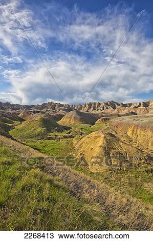 Afternoon sunshine hits the yellow mounds region in badlands national park; south dakota united states of america View Large Photo Image Stock Image - Afternoon sunshine hits the yellow mounds region in badlands national park; south dakota united states of america. Fotosearch
