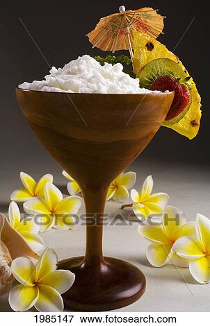 Close-Up Of A Koa Cocktail Glass Filled With A Creamy Tropical Drink. View Large Photo Image Stock Photo - Close-Up Of A Koa Cocktail Glass Filled With A Creamy Tropical Drink.. Fotosearch