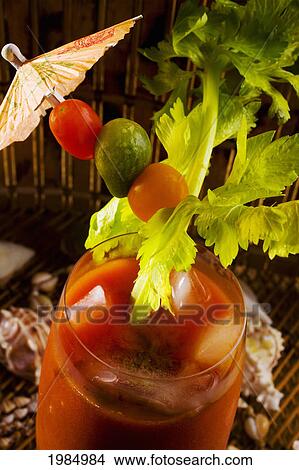 Close-Up Of An Exotic Tropical Drink, A Bloody Mary. View Large Photo Image Picture - Close-Up Of An Exotic Tropical Drink, A Bloody Mary.. Fotosearch