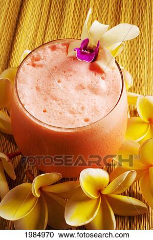 Close-Up Of An Exotic Tropical Drink. View Large Photo Image Stock Image - Close-Up Of An Exotic Tropical Drink.. Fotosearch