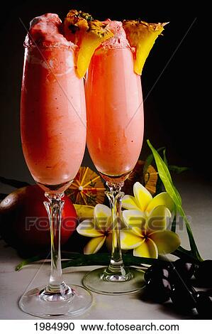 Close-Up Of Two Glasses Filled With A Creamy Pink Tropical Drink. View Large Photo Image Stock Image - Close-Up Of Two Glasses Filled With A Creamy Pink Tropical Drink.. Fotosearch