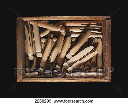 Clothes pins in a wooden crate View Large Photo Image Stock Photo - Clothes pins in a wooden crate. Fotosearch