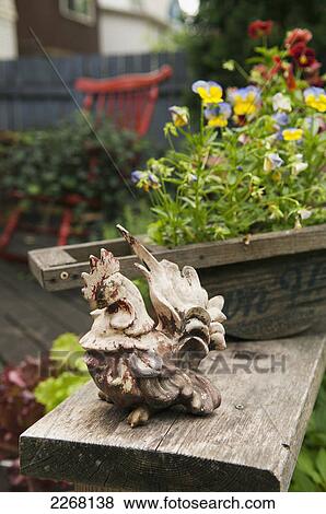 Stock Photo - Decor in a home garden; winnipeg manitoba canada. Fotosearch