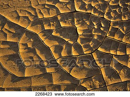 Dried and cracked mud badlands national park; south dakota united states of america View Large Photo Image Stock Image - Dried and cracked mud badlands national park; south dakota united states of america. Fotosearch