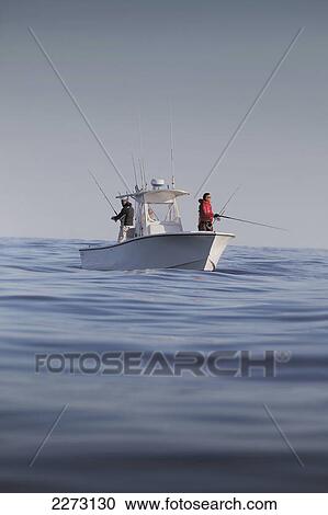 Stock Image - Fishing boat in cape cod bay; cape cod massachusetts united states of america. Fotosearch