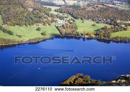 High angle view of boats making ripples on a lake; ullswater lake district cumbria england View Large Photo Image Stock Image - High angle view of boats making ripples on a lake; ullswater lake district cumbria england. Fotosearch