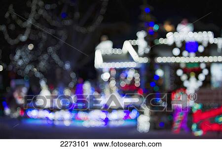 Stock Image - Impressionistic christmas lights on a house; edmonton alberta canada. Fotosearch