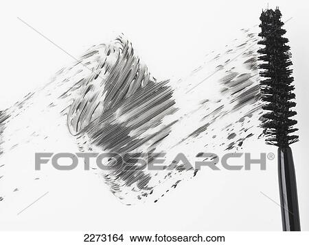 Mascara brush leaving traces of mascara on a white background View Large Photo Image Picture - Mascara brush leaving traces of mascara on a white background. Fotosearch