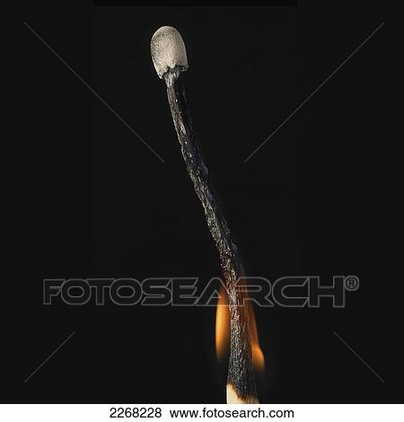 Match burning out against a black background View Large Photo Image Stock Photo - Match burning out against a black background. Fotosearch