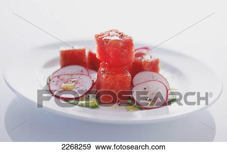 Melon salad on a white plate View Large Photo Image Stock Photo - Melon salad on a white plate. Fotosearch