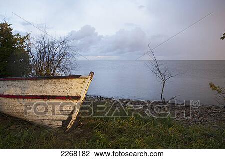 Old boat on the shore of lake winnipeg; hecla island manitoba canada View Large Photo Image Stock Image - Old boat on the shore of lake winnipeg; hecla island manitoba canada. Fotosearch