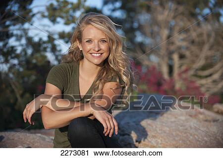 Stock Image - Portrait of a woman with long blond hair; arvada colorado united states of america. Fotosearch