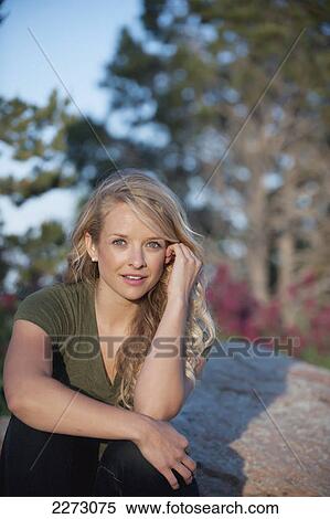 Portrait of a woman with long blond hair; arvada colorado united states of america View Large Photo Image Stock Photography - Portrait of a woman with long blond hair; arvada colorado united states of america. Fotosearch