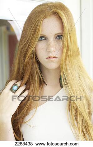 Portrait of a young woman with long red hair; kauai hawaii united states of america View Large Photo Image Stock Photo - Portrait of a young woman with long red hair; kauai hawaii united states of america. Fotosearch