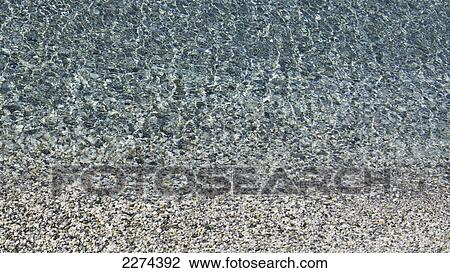 Rocks seen through clear water in kastani bay; skopelos island greece View Large Photo Image Stock Image - Rocks seen through clear water in kastani bay; skopelos island greece. Fotosearch