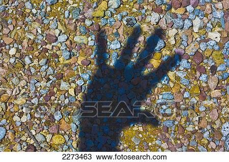 Shadow of hand with outstretched fingers against multi-coloured stones; turkey View Large Photo Image Stock Image - Shadow of hand with outstretched fingers against multi-coloured stones; turkey. Fotosearch