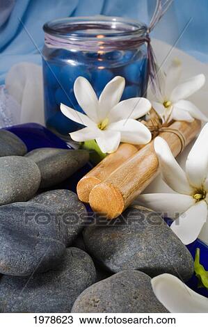 Spa Elements, Candle, Flowers, Hawaiian Hula Sticks And Grey Stones. View Large Photo Image Stock Image - Spa Elements, Candle, Flowers, Hawaiian Hula Sticks And Grey Stones.. Fotosearch