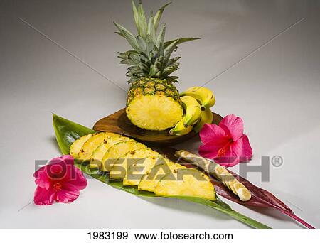 Studio Shot Of A Pineapple And Bananas, Cut Into Slices. View Large Photo Image Stock Photo - Studio Shot Of A Pineapple And Bananas, Cut Into Slices.. Fotosearch