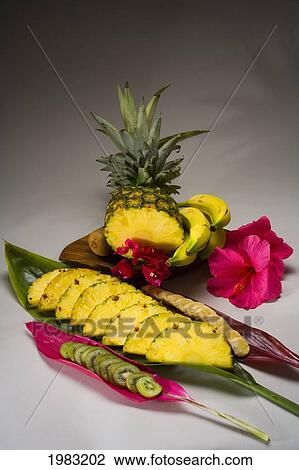 Studio Shot Of A Pineapple, Kiwi And Bananas, Cut Into Slices. View Large Photo Image Stock Image - Studio Shot Of A Pineapple, Kiwi And Bananas, Cut Into Slices.. Fotosearch