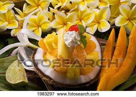 Studio Shot Of A Tropical Fruit Salad With Flowers. View Large Photo Image Stock Photo - Studio Shot Of A Tropical Fruit Salad With Flowers.. Fotosearch
