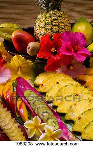 Studio Shot Of A Variety Of Tropical Fruit, Whole And Cut Into Slices. View Large Photo Image Stock Photo - Studio Shot Of A Variety Of Tropical Fruit, Whole And Cut Into Slices.. Fotosearch