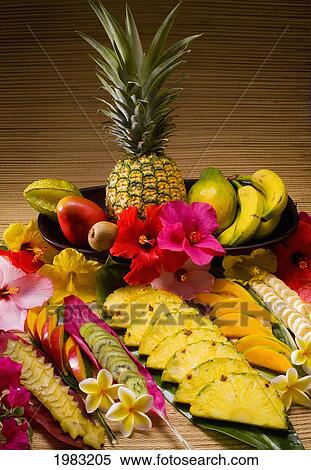 Studio Shot Of A Variety Of Tropical Fruit, Whole And Cut Into Slices. View Large Photo Image Stock Photography - Studio Shot Of A Variety Of Tropical Fruit, Whole And Cut Into Slices.. Fotosearch