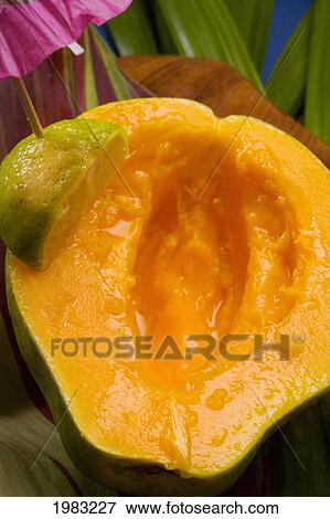 Studio Shot Of Half Of A Papaya, Seeds Removed. View Large Photo Image Stock Photo - Studio Shot Of Half Of A Papaya, Seeds Removed.. Fotosearch