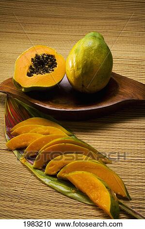 Studio Shot Of Papaya, Whole And In Slices. View Large Photo Image Stock Image - Studio Shot Of Papaya, Whole And In Slices.. Fotosearch