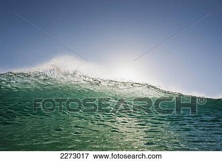 Sunlight reflecting on the water as it swells and splashes; tarifa cadiz andalusia spain View Large Photo Image Stock Photo - Sunlight reflecting on the water as it swells and splashes; tarifa cadiz andalusia spain. Fotosearch