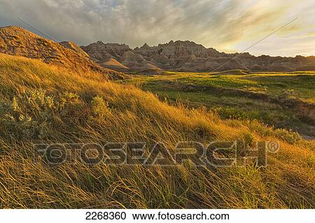 Sunset over the landscape of badlands national park; south dakota united states of america View Large Photo Image Stock Image - Sunset over the landscape of badlands national park; south dakota united states of america. Fotosearch