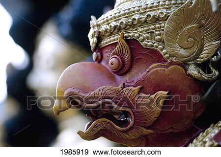 Thailand, Bangkok, Wat Traimit, Home Of World's Largest Golden Buddha, Close-Up Of A Garuda Sculpture. View Large Photo Image Stock Photo - Thailand, Bangkok, Wat Traimit, Home Of World's Largest Golden Buddha, Close-Up Of A Garuda Sculpture.. Fotosearch