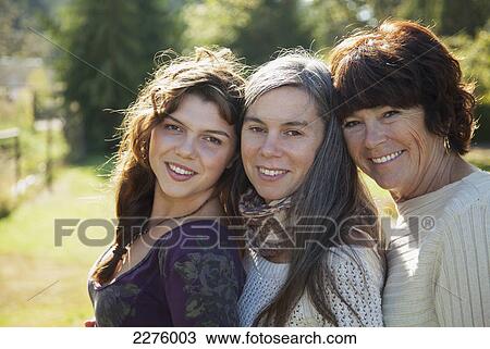 Three generations of a family including from left daughter mother and grandmother; british columbia canada View Large Photo Image Stock Image - Three generations of a family including from left daughter mother and grandmother; british columbia canada. Fotosearch