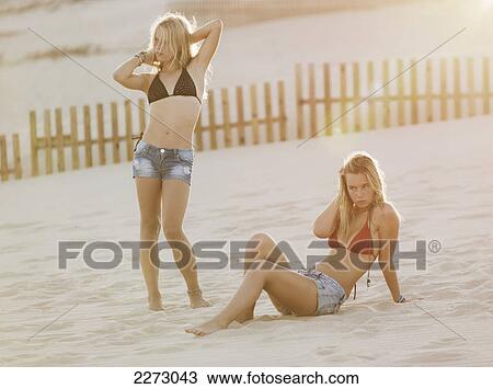 Two teenage girls on the beach; tarifa cadiz andalusia spain View Large Photo Image Stock Image - Two teenage girls on the beach; tarifa cadiz andalusia spain. Fotosearch