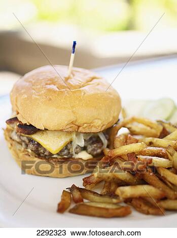 A hamburger and fries; Hawaii united states of america View Large Photo Image Stock Image - A hamburger and fries; Hawaii united states of america. Fotosearch