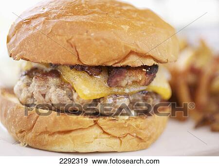 A hamburger with bacon and cheese; Hawaii united states of america View Large Photo Image Stock Photo - A hamburger with bacon and cheese; Hawaii united states of america. Fotosearch