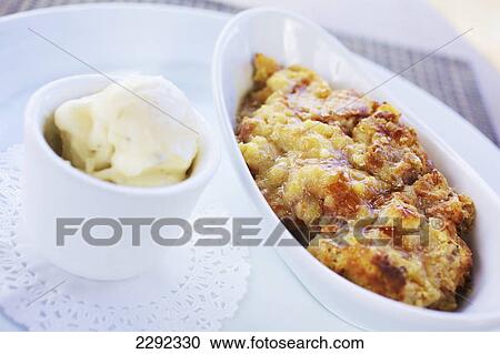 Stock Image - A meal served on white dishes; Hawaii united states of america. Fotosearch