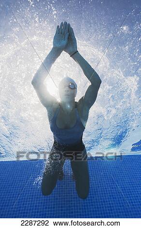 A woman swimming underwater; Tarifa cadiz andalusia spain View Large Photo Image Stock Image - A woman swimming underwater; Tarifa cadiz andalusia spain. Fotosearch