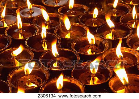 Picture - Buddhist butter lamps; Bohdgaya bihar india. Fotosearch