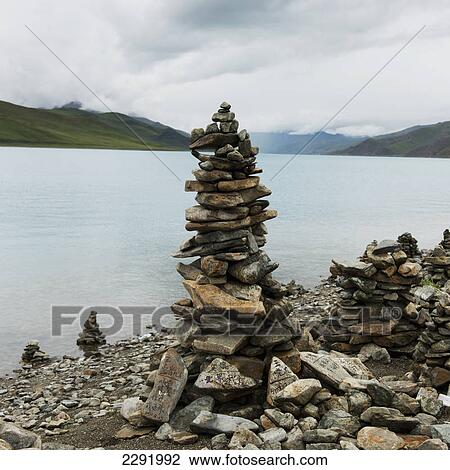 Cairn on the water's edge; Shannan xizang china View Large Photo Image Stock Image - Cairn on the water's edge; Shannan xizang china. Fotosearch