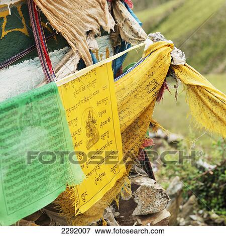 Green and yellow prayer flags; Shannan xizang china View Large Photo Image Stock Photo - Green and yellow prayer flags; Shannan xizang china. Fotosearch