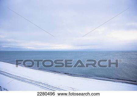 Looking out towards the beaufort sea coast in barrow at the original town site in winter; Barrow alaska united states of america View Large Photo Image Stock Photograph - Looking out towards the beaufort sea coast in barrow at the original town site in winter; Barrow alaska united states of america. Fotosearch