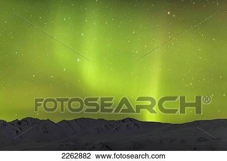 Northern lights glow in the sky above the foothills of the alaska range in winter isabel pass richardson highway; Anchorage alaska united states of america View Large Photo Image Stock Image - Northern lights glow in the sky above the foothills of the alaska range in winter isabel pass richardson highway; Anchorage alaska united states of america. Fotosearch