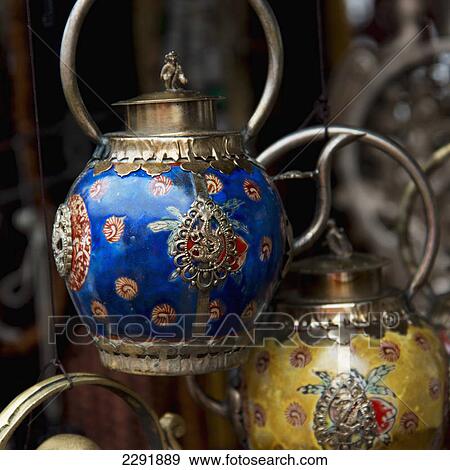 Stock Photo - Ornate colourful teapots; Xizang china. Fotosearch