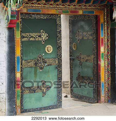 Ornate green doorway with open door; Xizang china View Large Photo Image Stock Image - Ornate green doorway with open door; Xizang china. Fotosearch